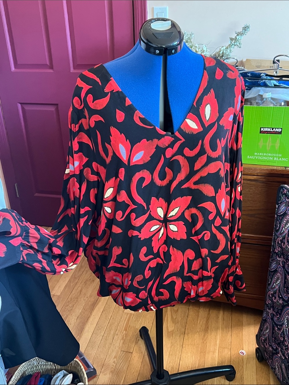 Karen Kane Black Blouse with Red Floral Motif